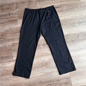 Athleta black slip on pant loose fit wide leg pre-owned but great condition M